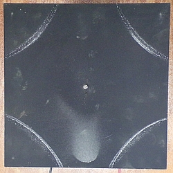 One curved (inward) node at each corner